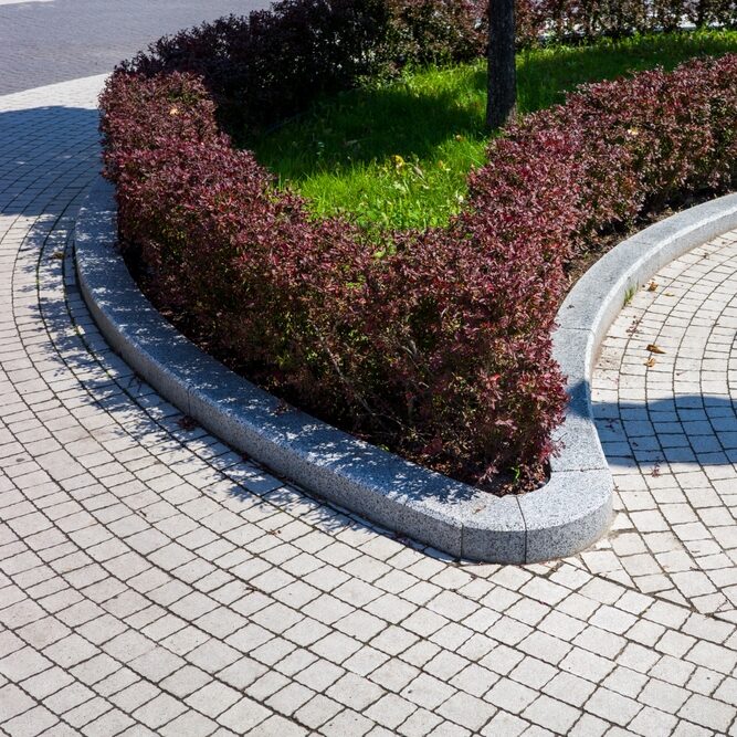 Tiles,Around,A,Flower,Bed,In,A,Landscape,Recreation,Park